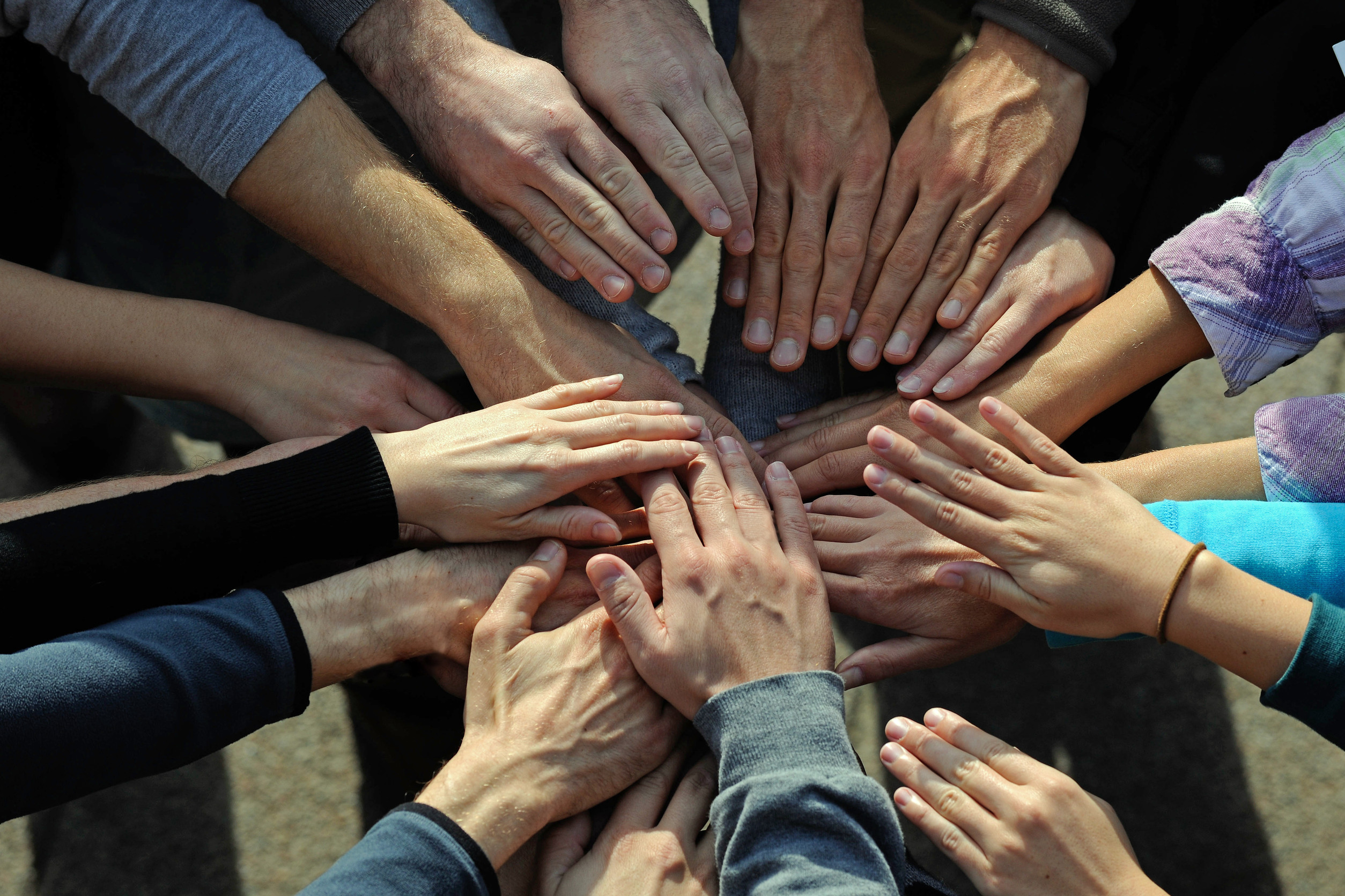 Hands on top of hands