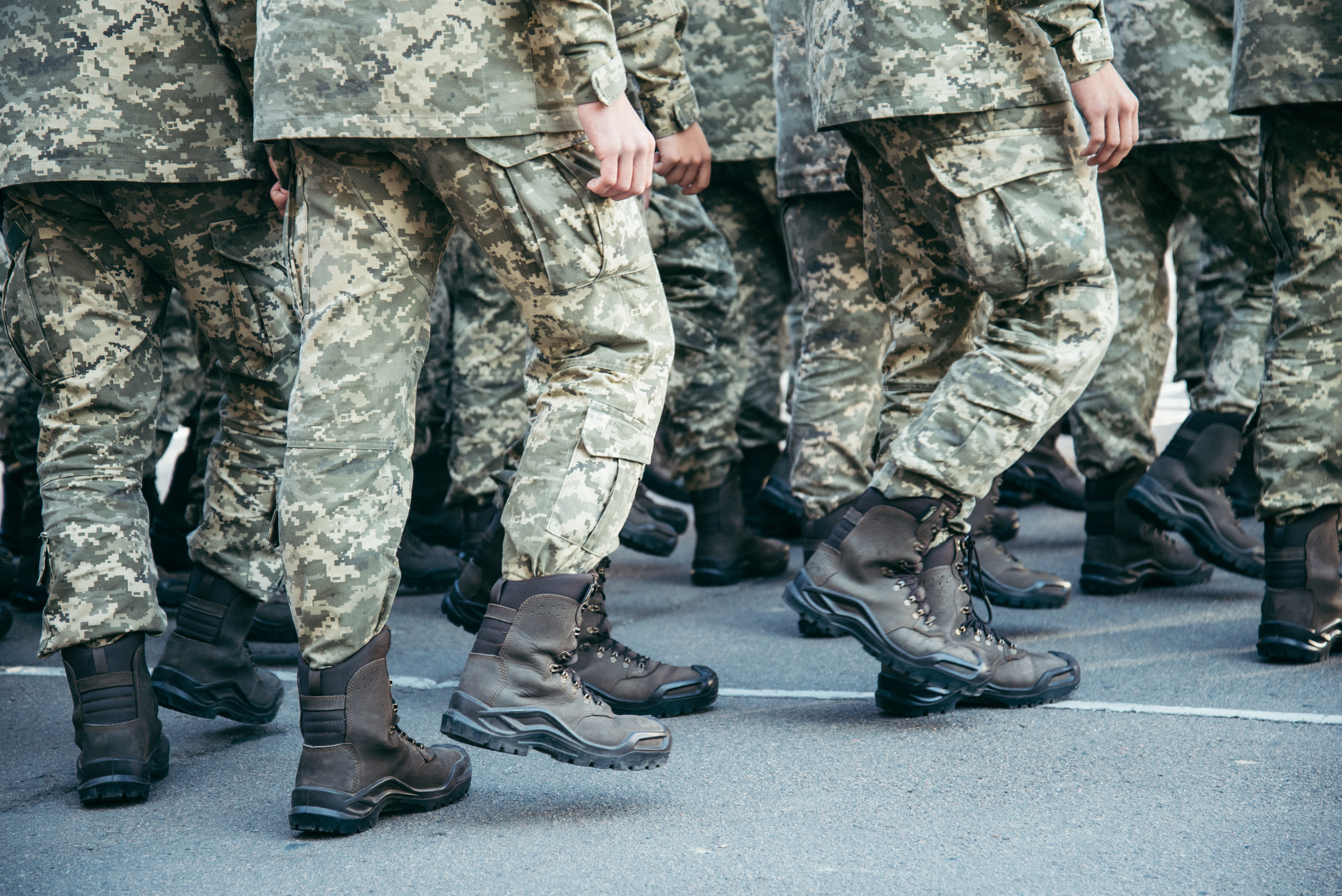 Military boots army walk the parade ground crop photo