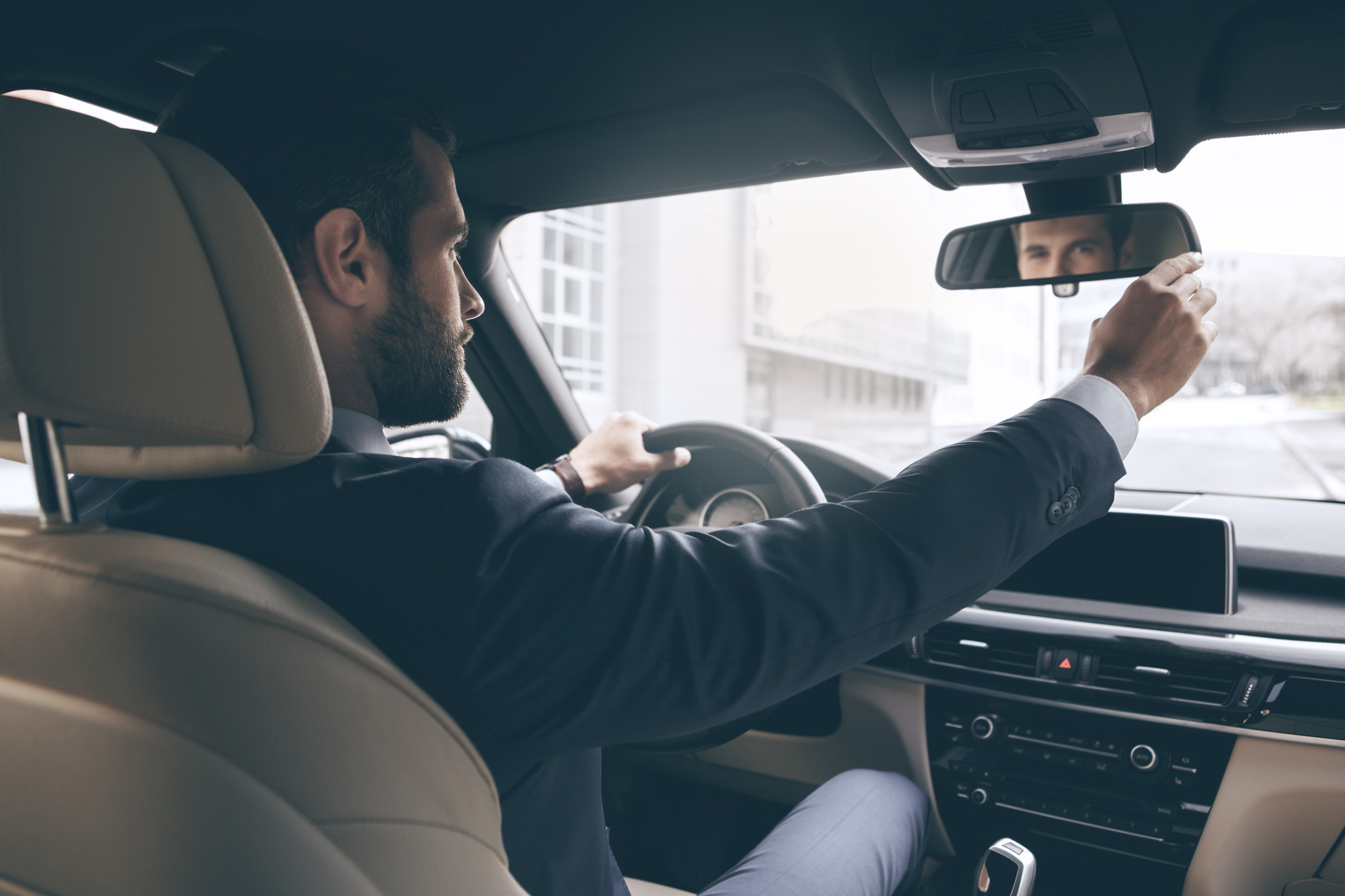 Man Sitting In Car