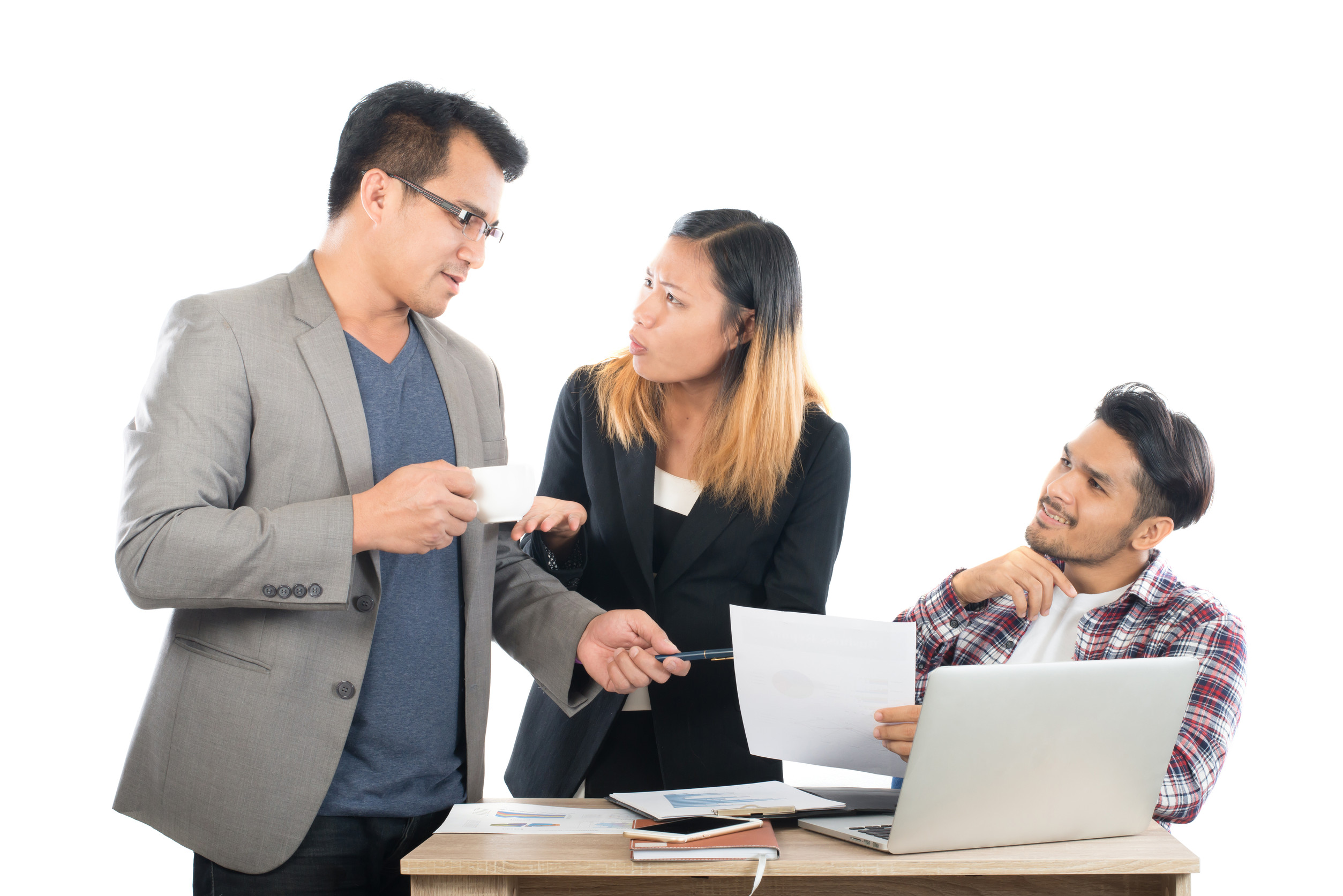 Portrait of business partners discussing documents and ideas at meeting in office isolated on white background.