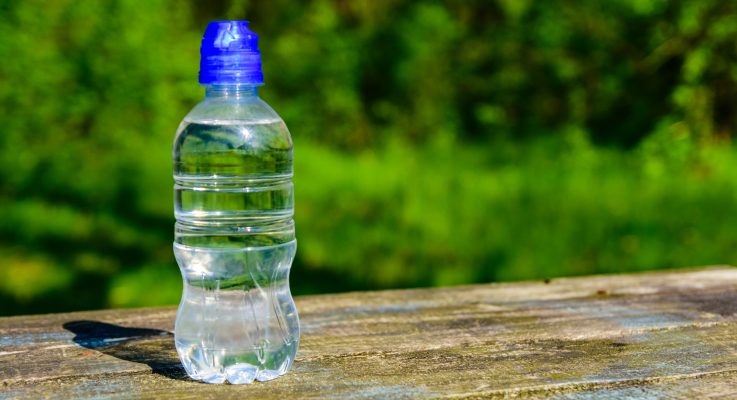 Why Some Criminals Leave a Water Bottle on Your Car Tire—And What It Means