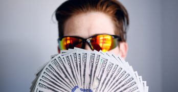 guy flashing money